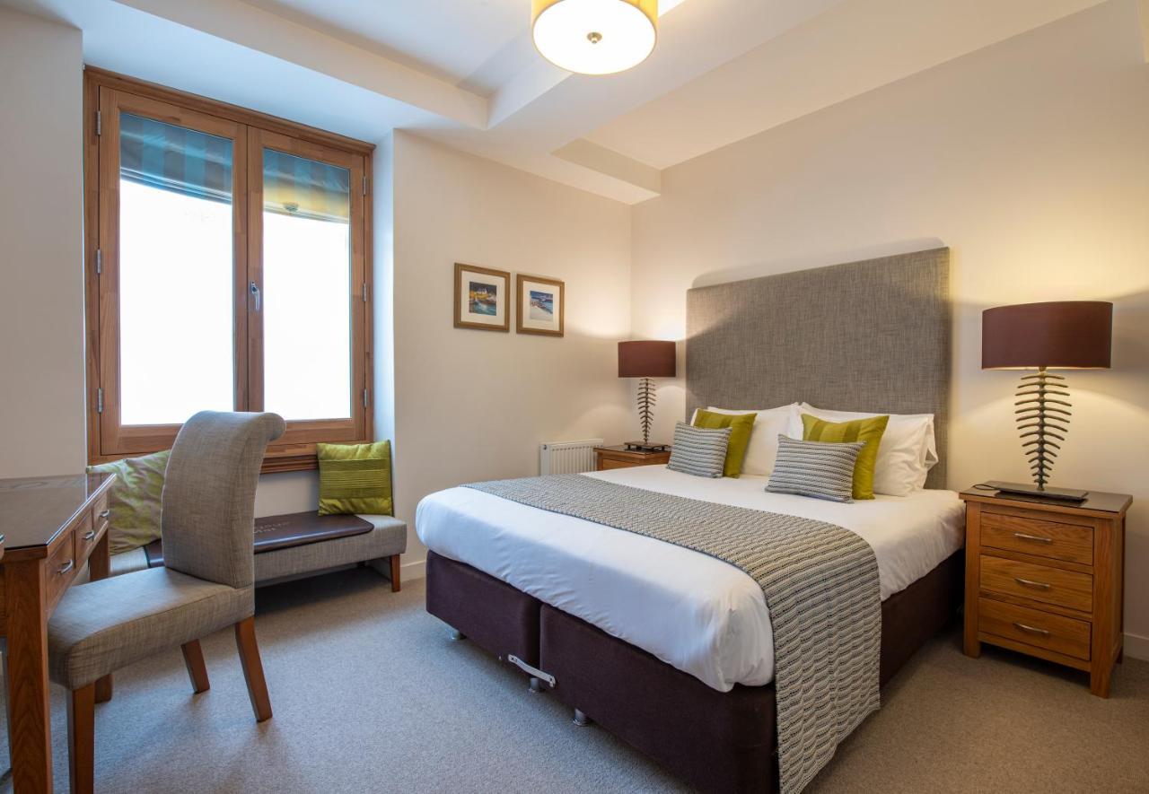 Inverness City Suites Extérieur photo