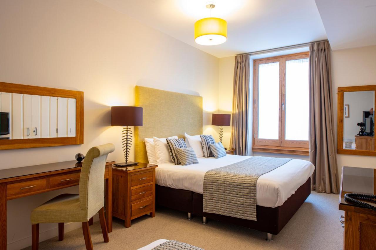Inverness City Suites Extérieur photo