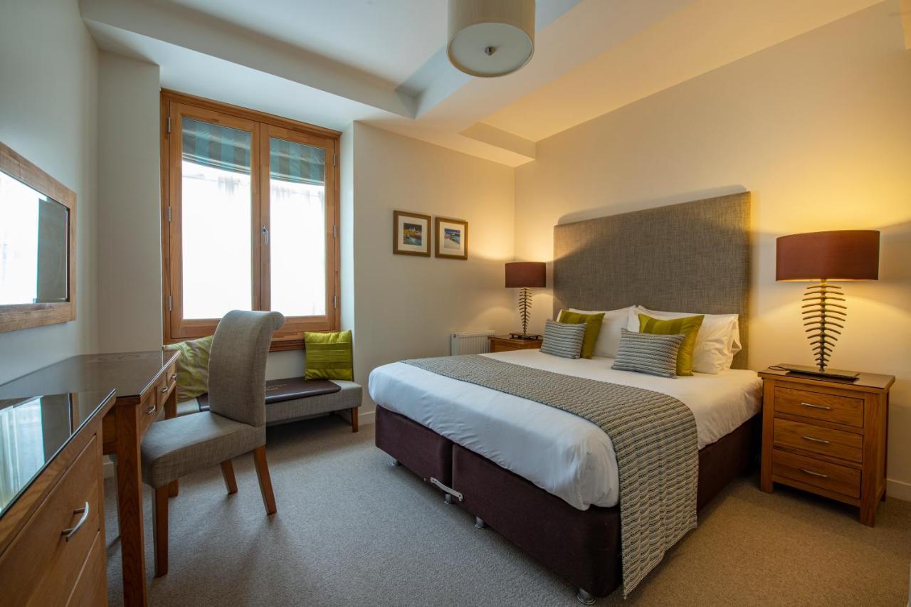 Inverness City Suites Extérieur photo